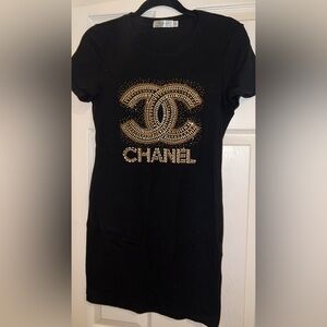 Chanel black & gold dress in a size small.